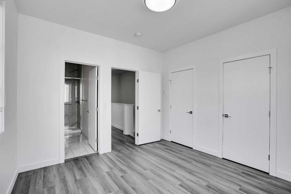 105 Panatella Square Nw, Calgary, AB - Indoor Photo Showing Other Room