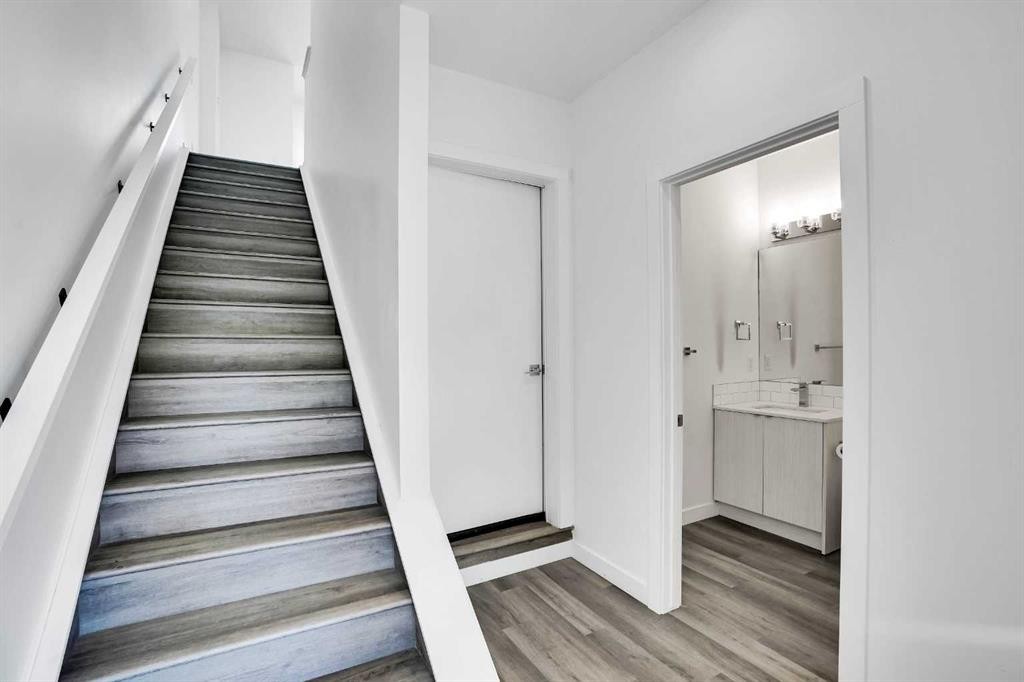 105 Panatella Square Nw, Calgary, AB - Indoor Photo Showing Other Room
