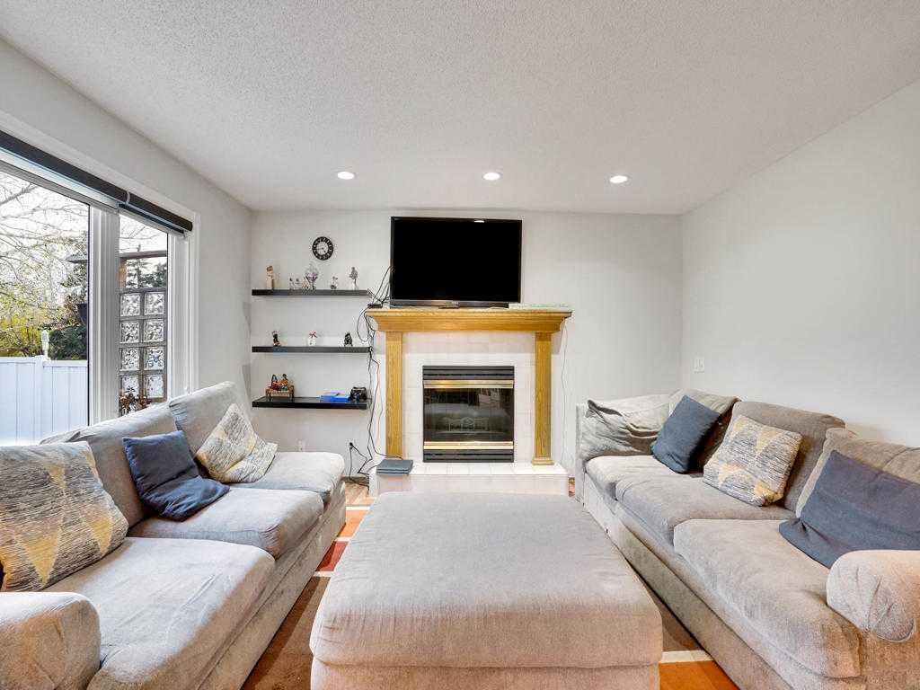 151 Citadel Park Nw, Calgary, AB - Indoor Photo Showing Living Room With Fireplace