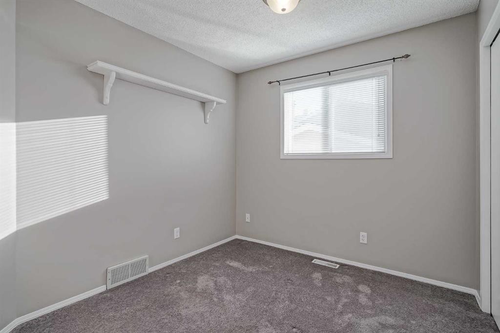 8 Millbank Road Sw, Calgary, AB - Indoor Photo Showing Other Room