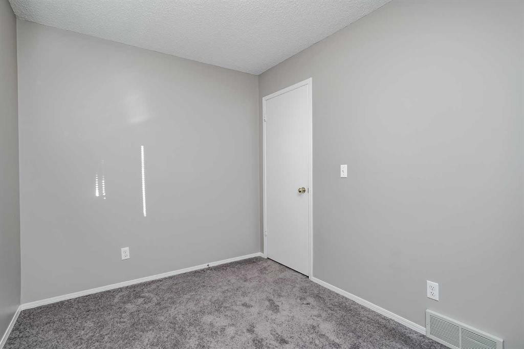 8 Millbank Road Sw, Calgary, AB - Indoor Photo Showing Other Room