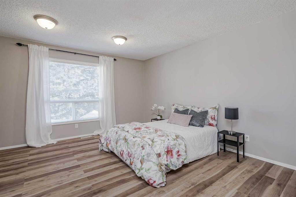 8 Millbank Road Sw, Calgary, AB - Indoor Photo Showing Bedroom