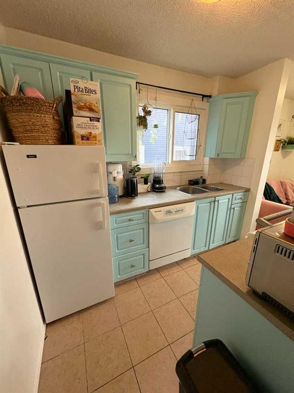 203-1625 11 Avenue Sw, Calgary, AB - Indoor Photo Showing Kitchen With Double Sink