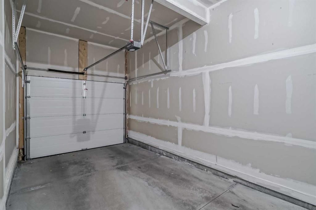 92 Walden Lane Se, Calgary, AB - Indoor Photo Showing Garage