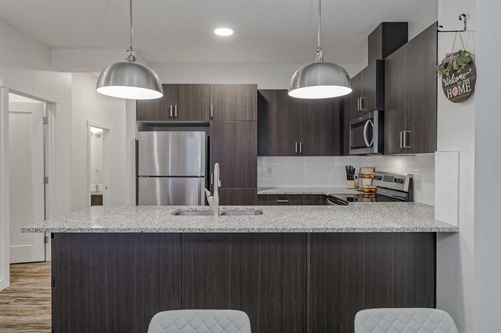92 Walden Lane Se, Calgary, AB - Indoor Photo Showing Kitchen With Stainless Steel Kitchen With Double Sink With Upgraded Kitchen