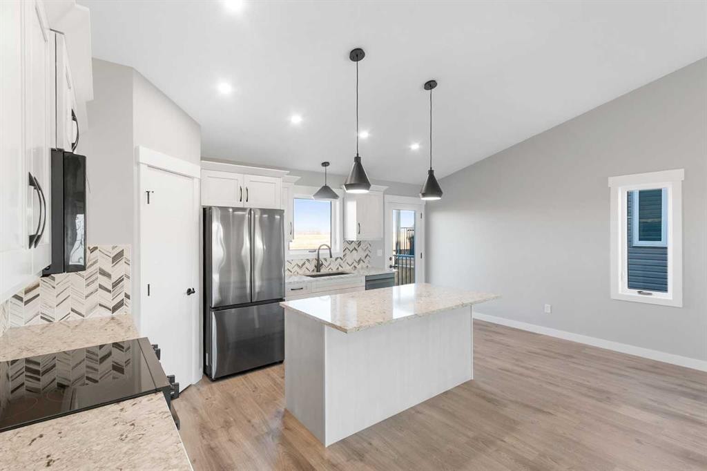 3422 Victory Way, Olds, AB - Indoor Photo Showing Kitchen With Upgraded Kitchen