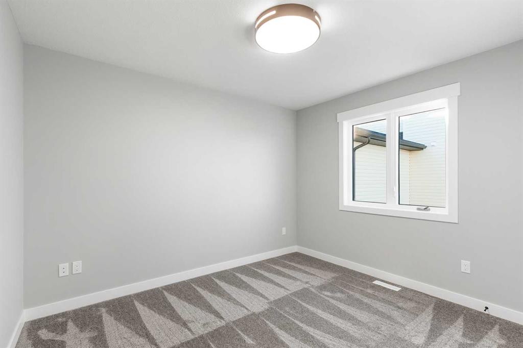 3422 Victory Way, Olds, AB - Indoor Photo Showing Other Room