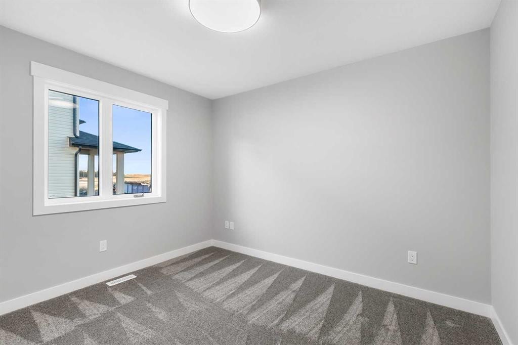 3422 Victory Way, Olds, AB - Indoor Photo Showing Other Room