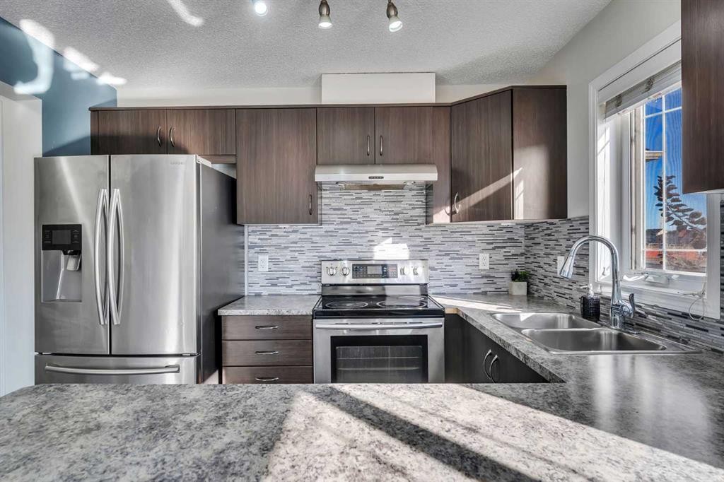 58 Cityscape Avenue Ne, Calgary, AB - Indoor Photo Showing Kitchen With Stainless Steel Kitchen With Double Sink With Upgraded Kitchen