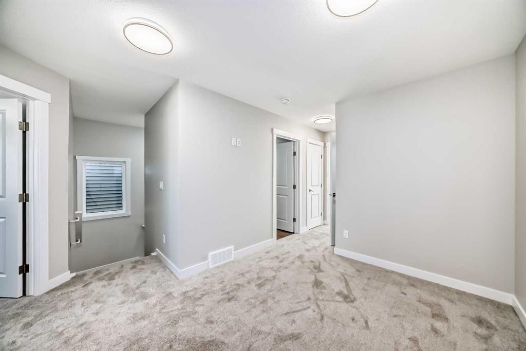 144 Belvedere Park Se, Calgary, AB - Indoor Photo Showing Other Room