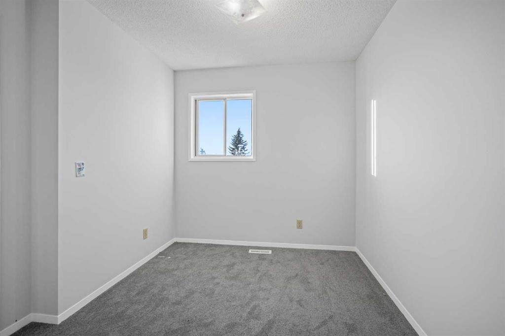 103 Taradale Drive Ne, Calgary, AB - Indoor Photo Showing Other Room