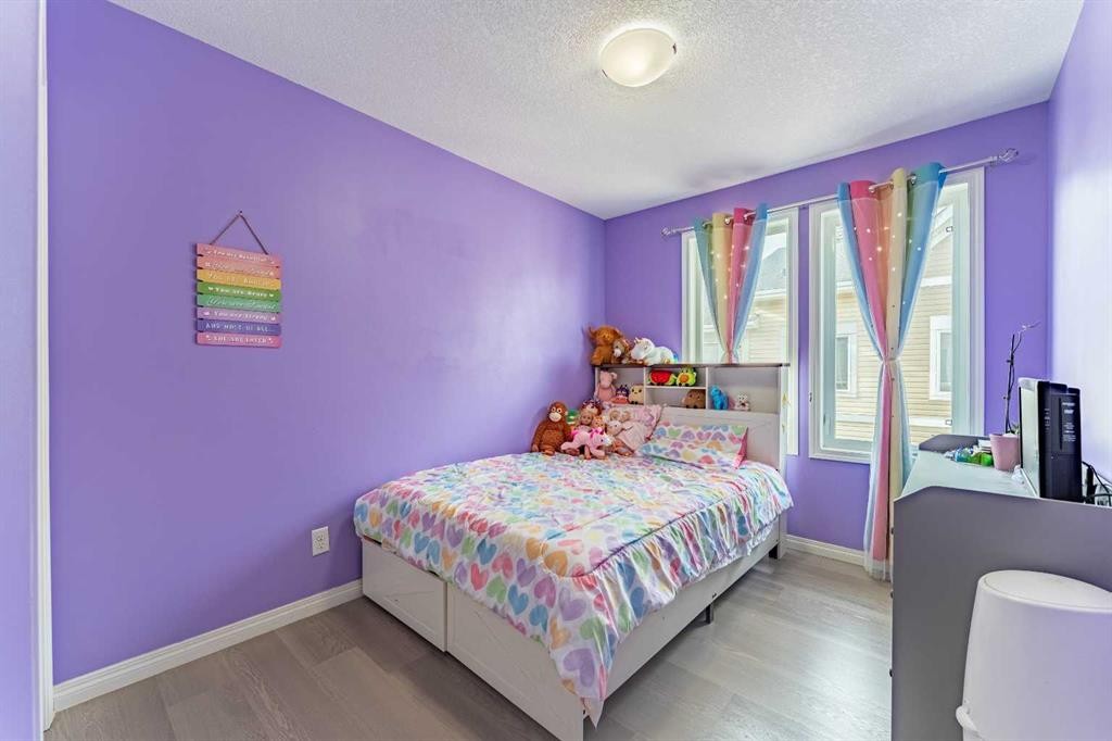 37 Auburn Bay Link Se, Calgary, AB - Indoor Photo Showing Bedroom