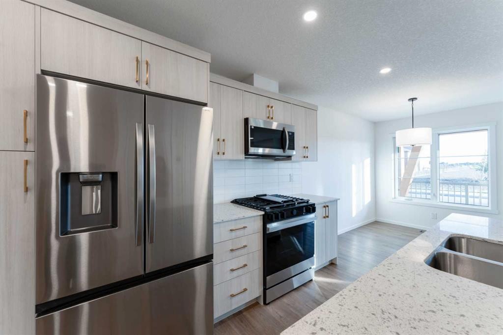 1170 148 Avenue Nw, Calgary, AB - Indoor Photo Showing Kitchen With Stainless Steel Kitchen With Double Sink With Upgraded Kitchen