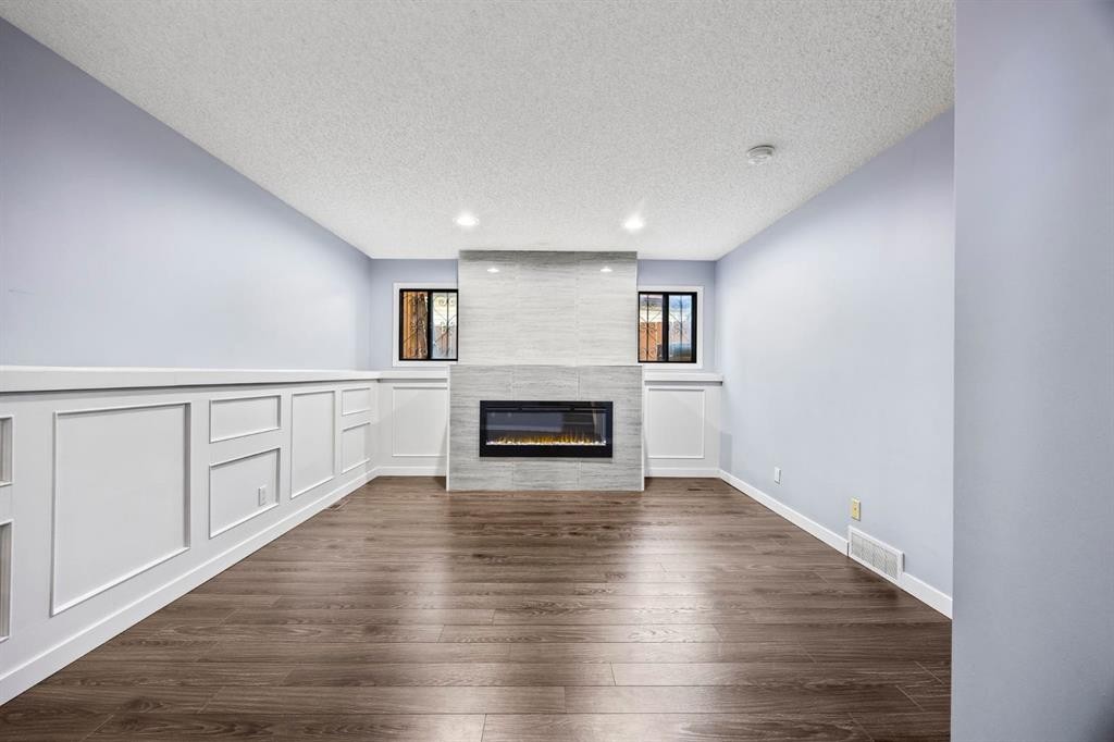 80 Templewood Road Ne, Calgary, AB - Indoor With Fireplace