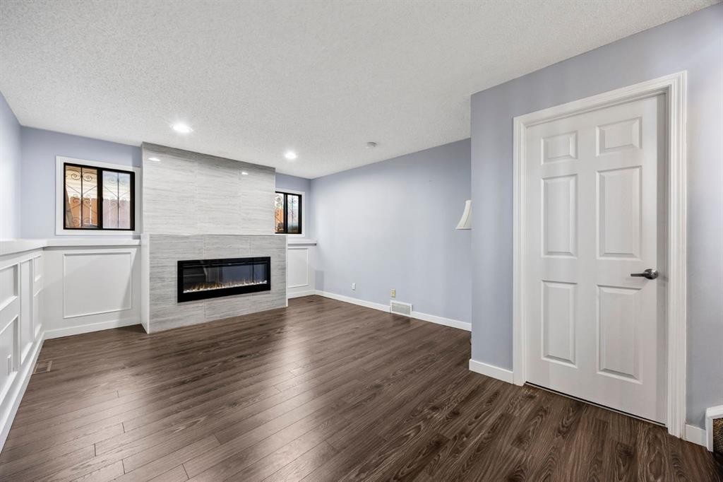 80 Templewood Road Ne, Calgary, AB - Indoor With Fireplace