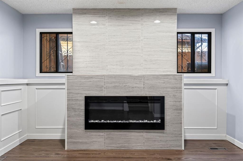 80 Templewood Road Ne, Calgary, AB - Indoor Photo Showing Living Room With Fireplace