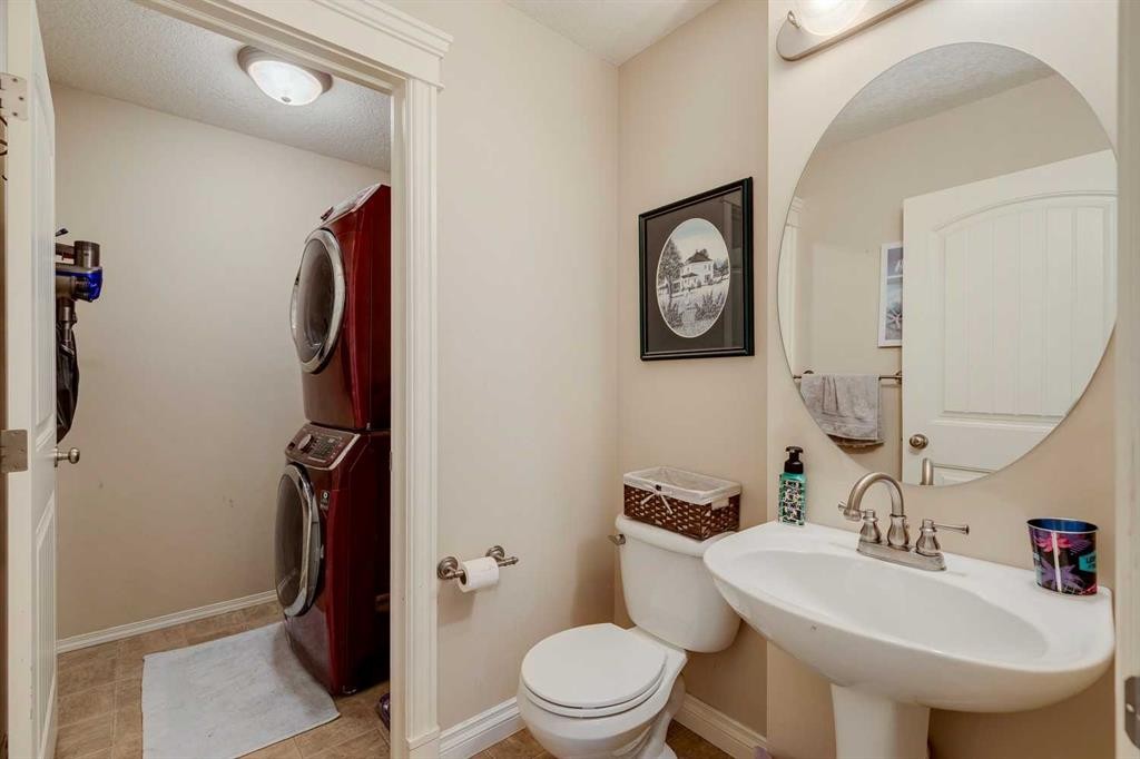 184 Cimarron Park Circle, Okotoks, AB - Indoor Photo Showing Laundry Room