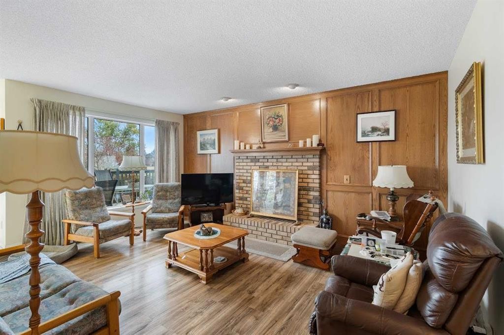 224 Douglas Woods Point Se, Calgary, AB - Indoor Photo Showing Living Room With Fireplace