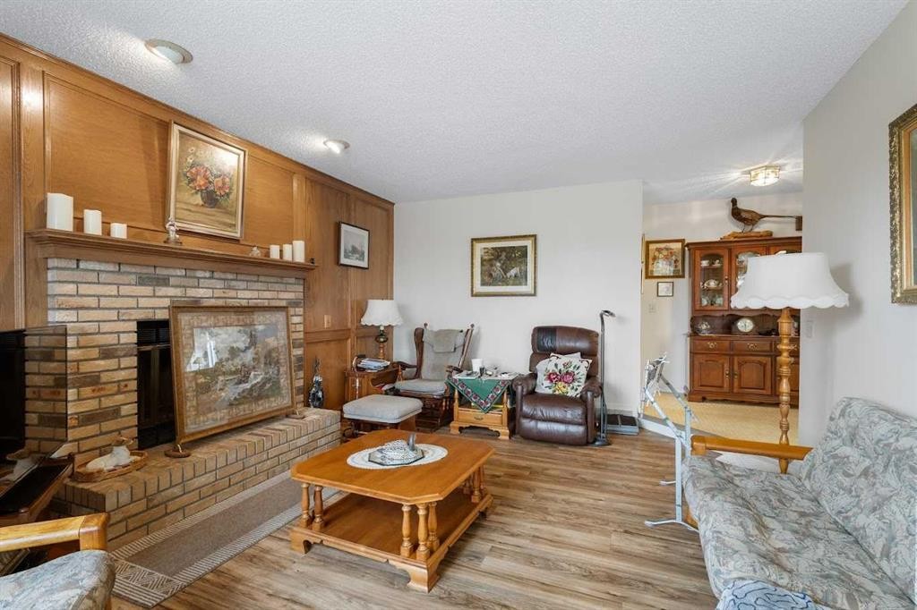 224 Douglas Woods Point Se, Calgary, AB - Indoor Photo Showing Living Room With Fireplace