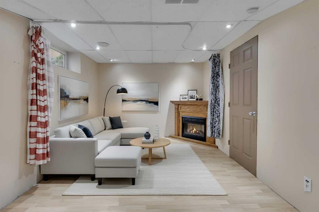 87 Coventry Road Ne, Calgary, AB - Indoor With Fireplace