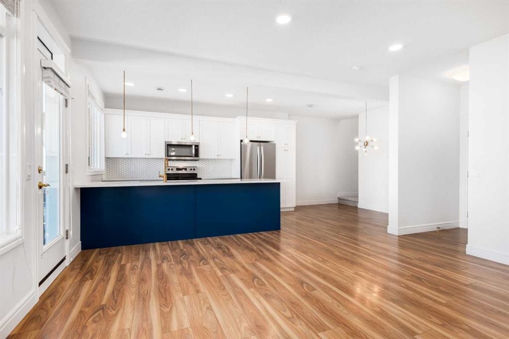 4341 Seton Drive Se, Calgary, AB - Indoor Photo Showing Kitchen With Stainless Steel Kitchen With Upgraded Kitchen