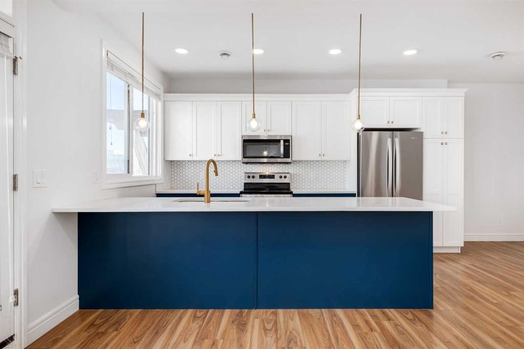 4341 Seton Drive Se, Calgary, AB - Indoor Photo Showing Kitchen With Stainless Steel Kitchen With Upgraded Kitchen