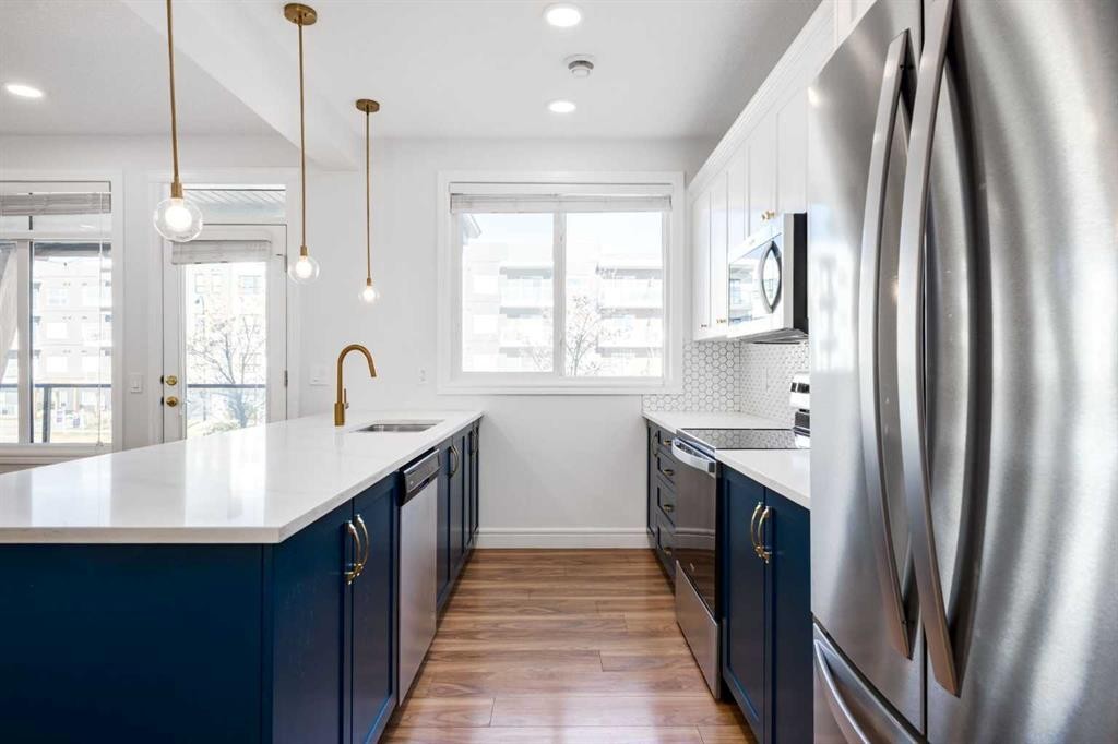 4341 Seton Drive Se, Calgary, AB - Indoor Photo Showing Kitchen With Stainless Steel Kitchen With Upgraded Kitchen