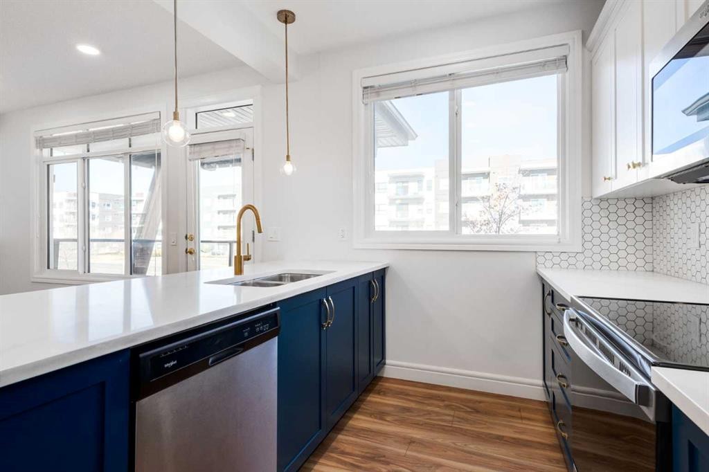 4341 Seton Drive Se, Calgary, AB - Indoor Photo Showing Kitchen With Double Sink With Upgraded Kitchen