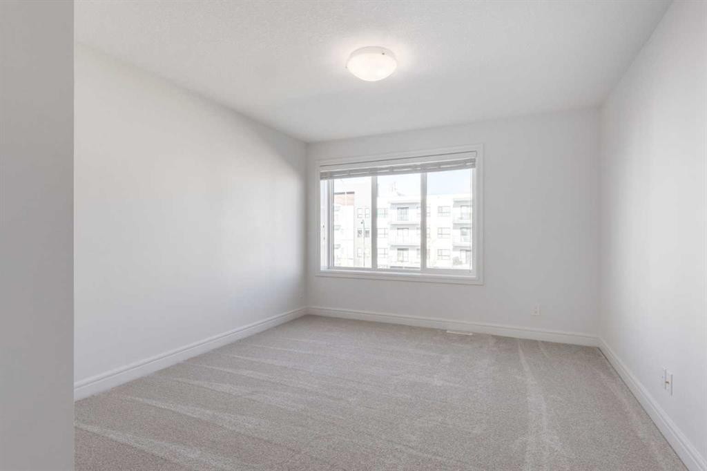 4341 Seton Drive Se, Calgary, AB - Indoor Photo Showing Other Room