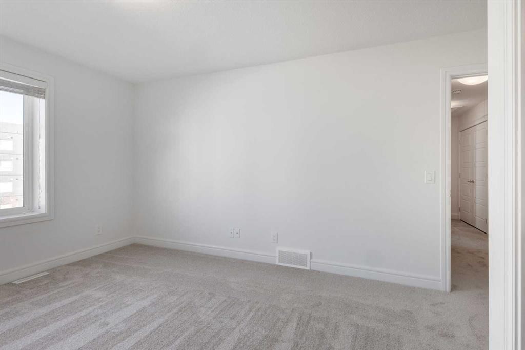 4341 Seton Drive Se, Calgary, AB - Indoor Photo Showing Other Room