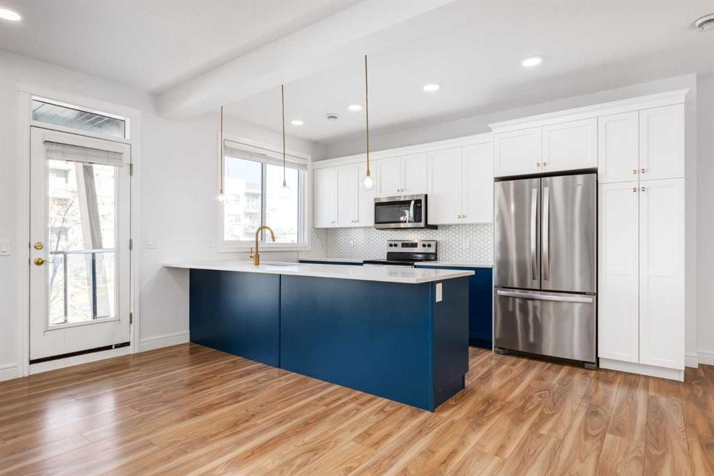 4341 Seton Drive Se, Calgary, AB - Indoor Photo Showing Kitchen With Stainless Steel Kitchen With Upgraded Kitchen