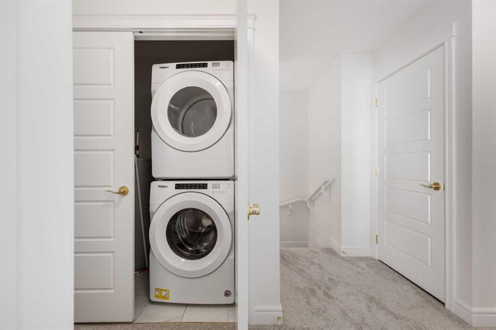 4341 Seton Drive Se, Calgary, AB - Indoor Photo Showing Laundry Room