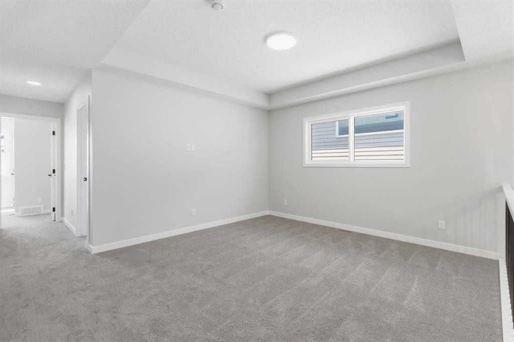 132 Lewiston Drive Ne, Calgary, AB - Indoor Photo Showing Other Room