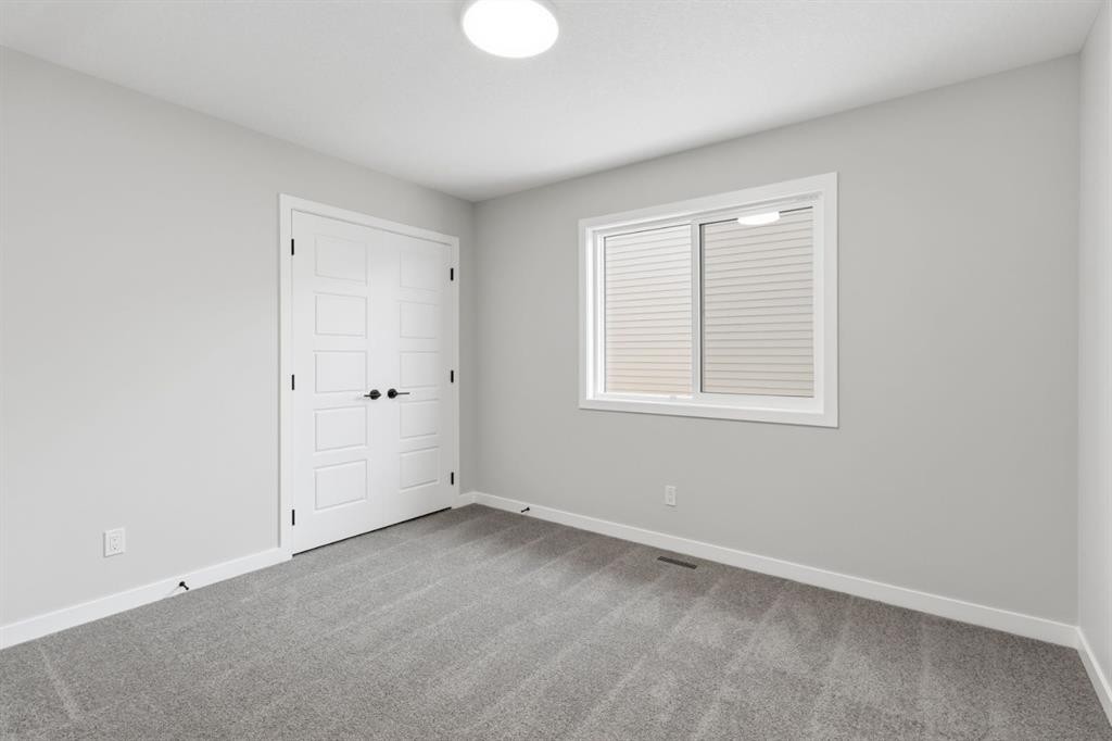 132 Lewiston Drive Ne, Calgary, AB - Indoor Photo Showing Other Room