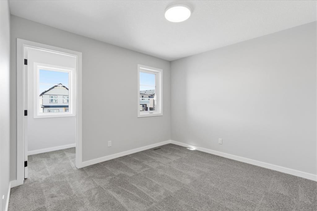 132 Lewiston Drive Ne, Calgary, AB - Indoor Photo Showing Other Room