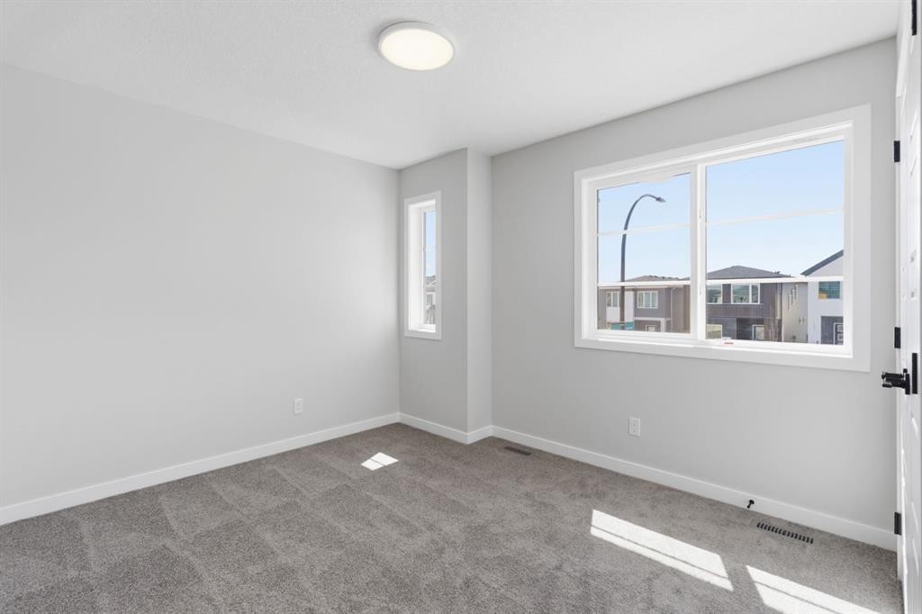 132 Lewiston Drive Ne, Calgary, AB - Indoor Photo Showing Other Room