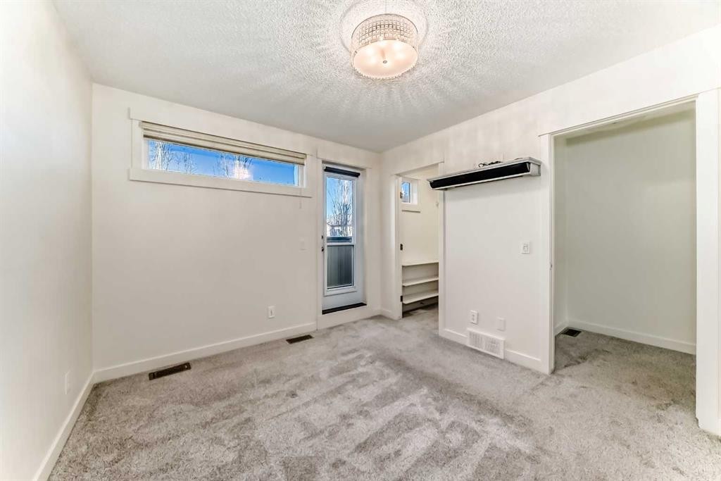 418 Covecreek Circle Ne, Calgary, AB - Indoor Photo Showing Other Room