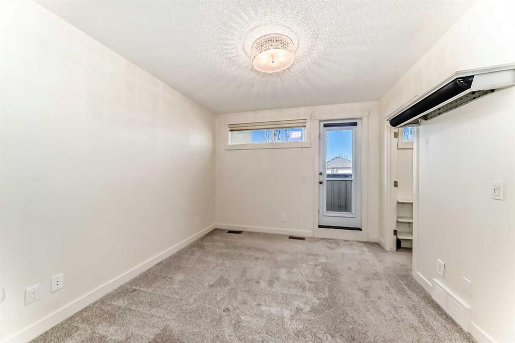 418 Covecreek Circle Ne, Calgary, AB - Indoor Photo Showing Other Room
