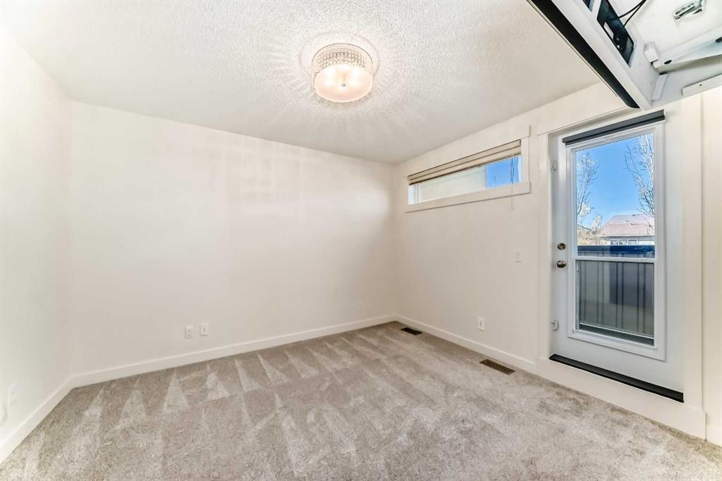 418 Covecreek Circle Ne, Calgary, AB - Indoor Photo Showing Other Room