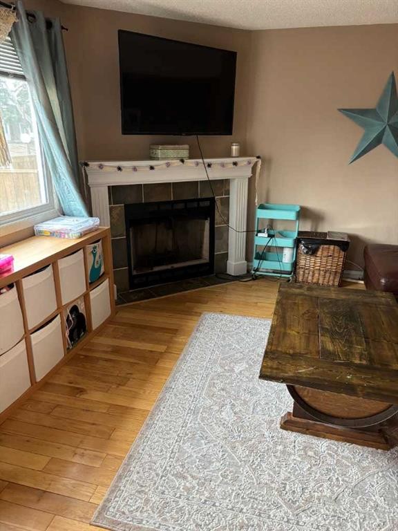 54-6020 Temple Drive Ne, Calgary, AB - Indoor Photo Showing Living Room With Fireplace