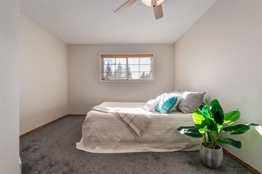 12 Millrise Green Sw, Calgary, AB - Indoor Photo Showing Bedroom