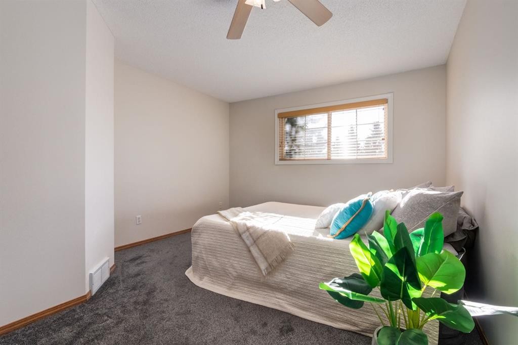 12 Millrise Green Sw, Calgary, AB - Indoor Photo Showing Bedroom