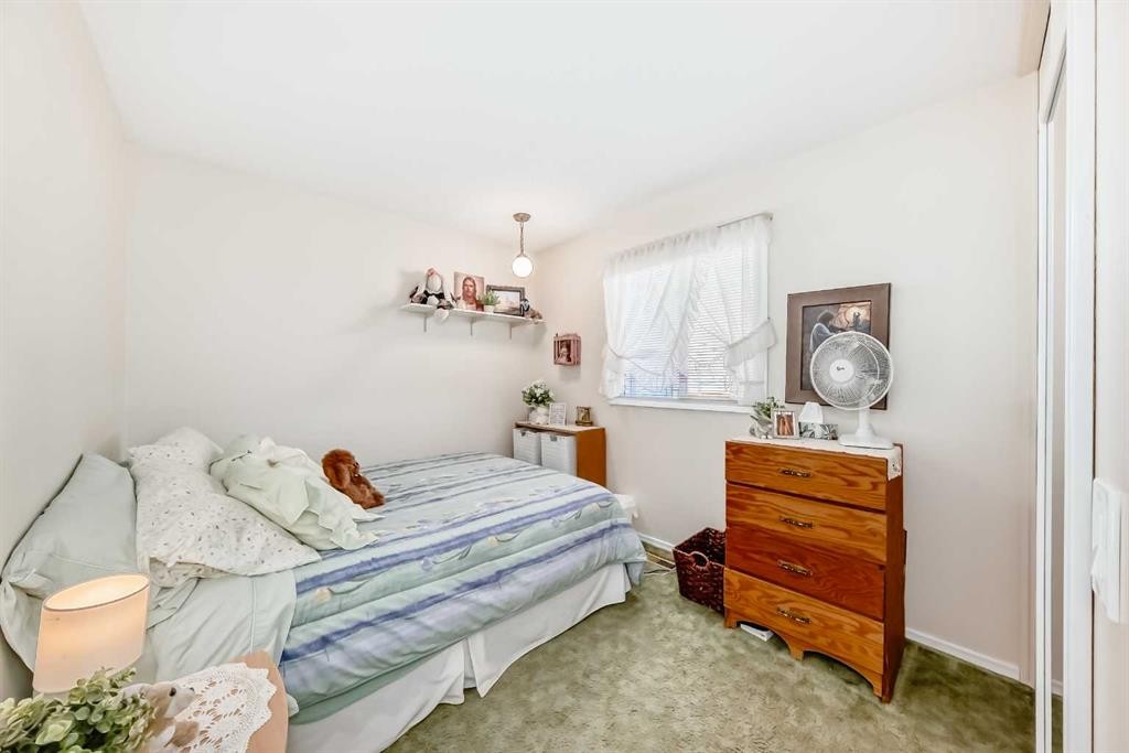 9 Maple Place, Strathmore, AB - Indoor Photo Showing Bedroom