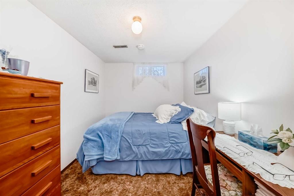 9 Maple Place, Strathmore, AB - Indoor Photo Showing Bedroom