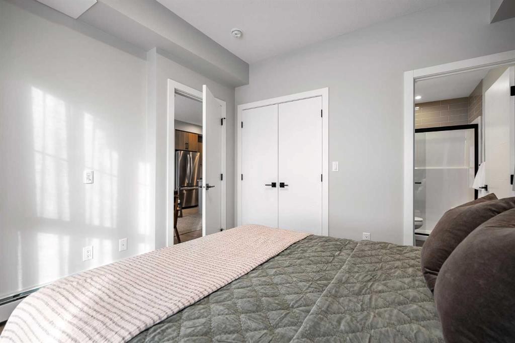 4102-100 Banister Drive, Okotoks, AB - Indoor Photo Showing Bedroom