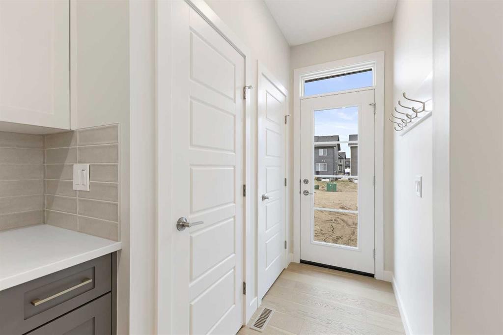 59 Agate Road, Cochrane, AB - Indoor Photo Showing Other Room