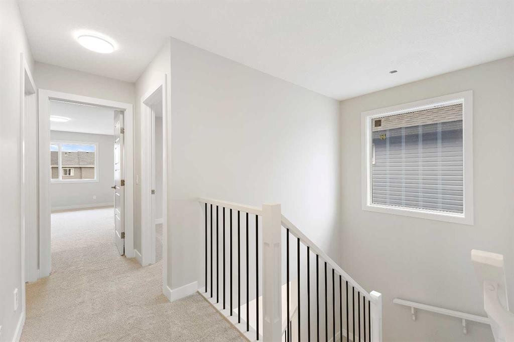 59 Agate Road, Cochrane, AB - Indoor Photo Showing Other Room