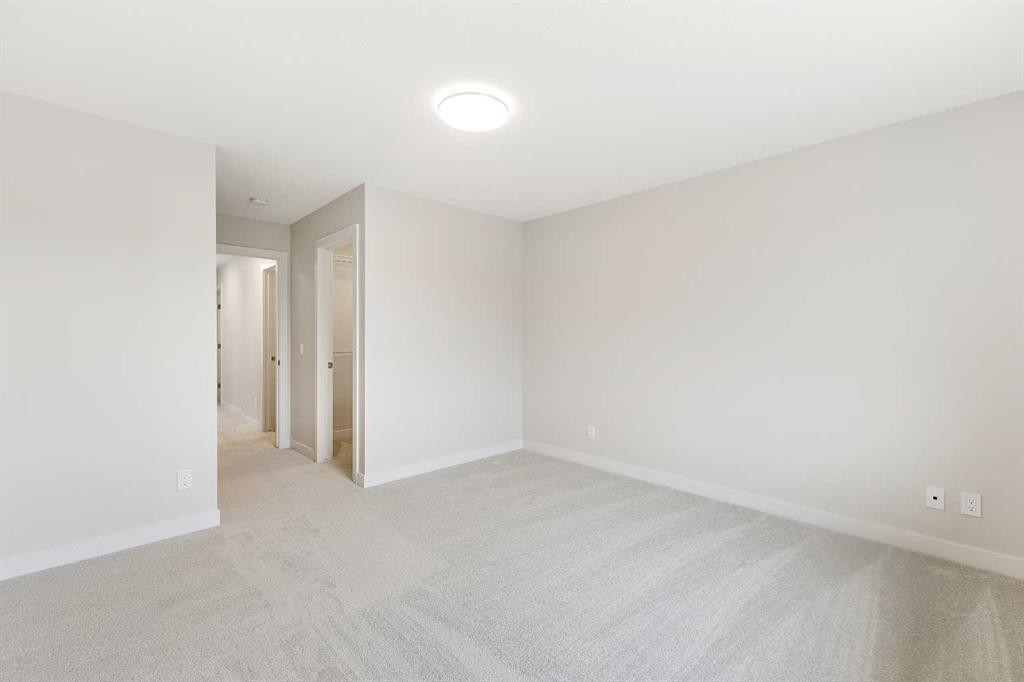 59 Agate Road, Cochrane, AB - Indoor Photo Showing Other Room