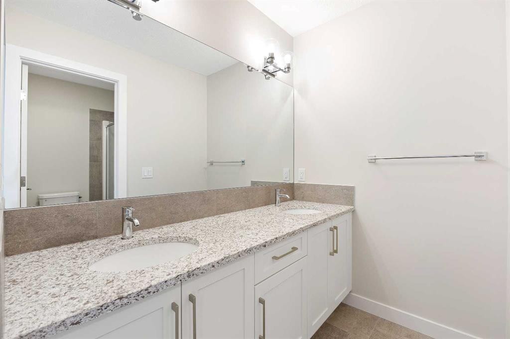 59 Agate Road, Cochrane, AB - Indoor Photo Showing Bathroom
