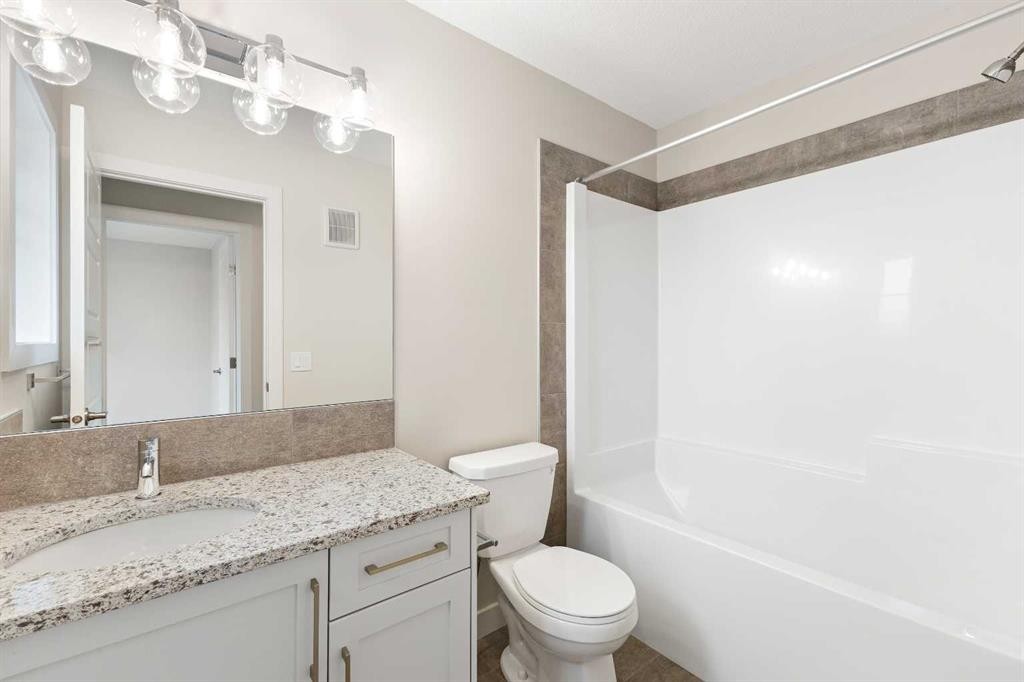 59 Agate Road, Cochrane, AB - Indoor Photo Showing Bathroom